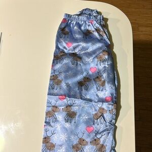 Adorable American Girl pajama bottoms. Size 6-7. Excellent condition.